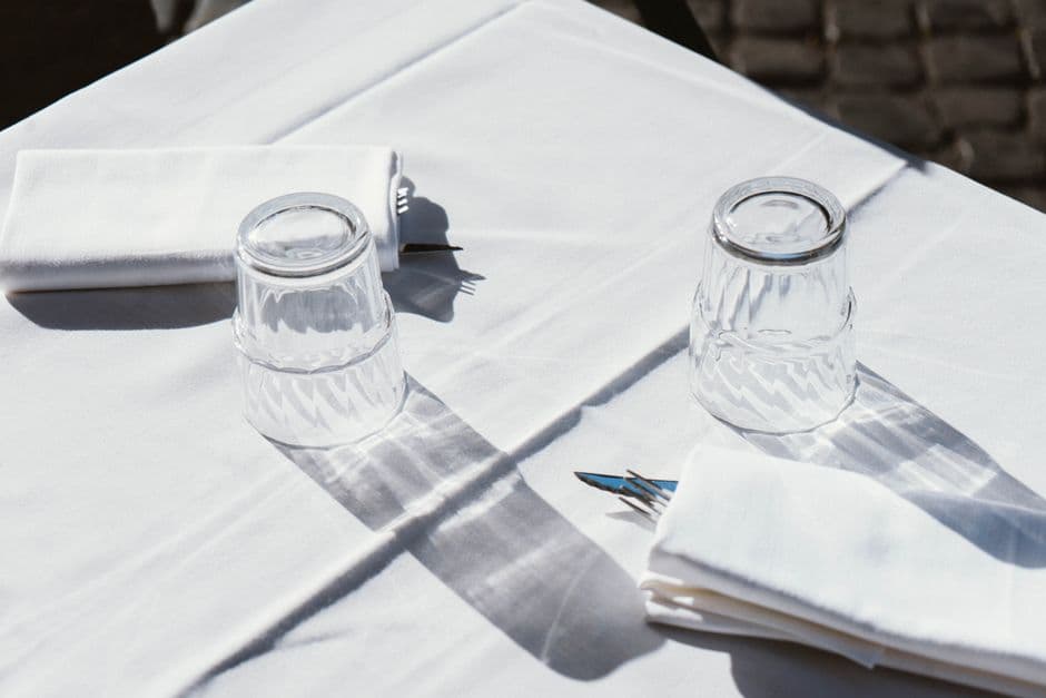 An outdoor table at a neighborhood restaurant in Rome away from the tourist center