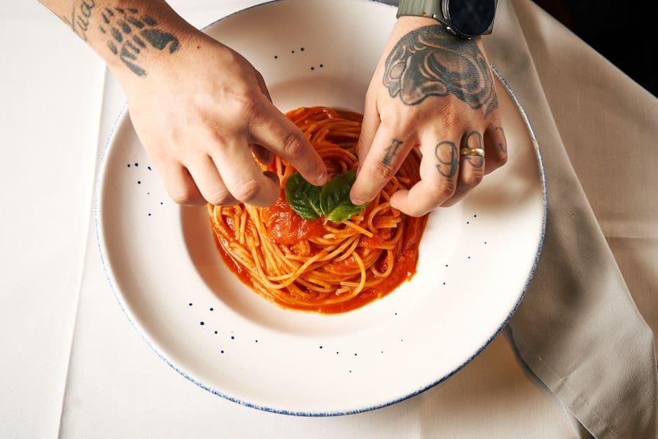 A plate of Roman trattoria pasta in Testaccio, the neighborhood with the best food in Rome