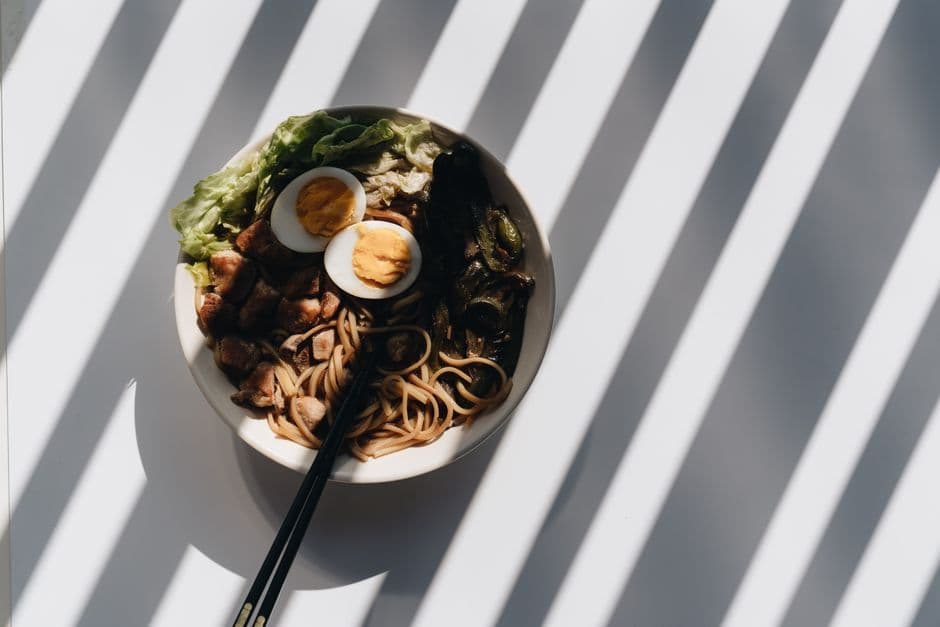 A bowl of ramen with egg and chashu, the benchmark for what food costs in Tokyo