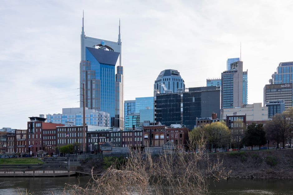 Downtown Nashville skyline seen across the Cumberland River, with the twin spired AT&T building at center